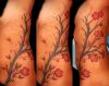cherry blossom ribs tattoo